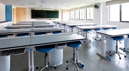 School physics lab classroom with desks and chairs