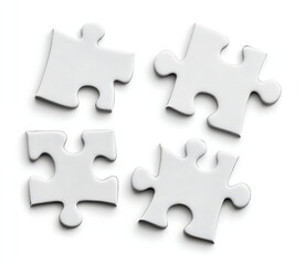 Obraz premium white puzzle pieces on the table on white background