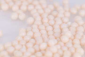 Close up of medical mini granules on surface