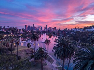 Aerial view of downtown Los Angeles city skyline and skyscrapers during golden at sunset from Echo Park.