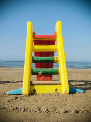 Plastic slide on the beach