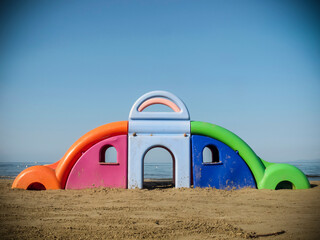 Outdoor plastic playground for children on the beach