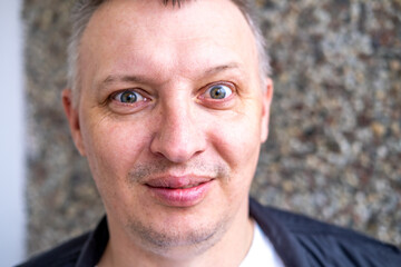 the face of a cheerful smiling happy person