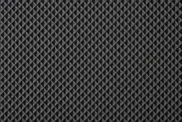 gray background, photo shows texture of rubber mat