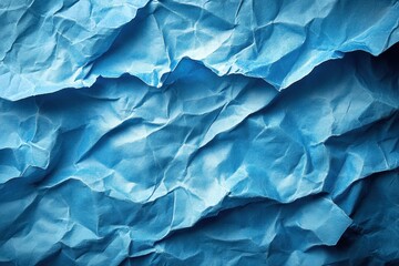 Obraz premium Crumpled light blue paper texture creates an abstract background for creative projects and designs