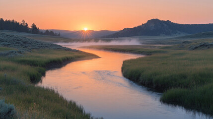 Fototapeta premium Yellowstone National Park Hayden Valley at sunrise, with mist rolling over the river and wildlife stirring