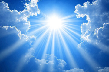 sun is shining brightly through the clouds, creating a beautiful and serene scene. The blue sky and the sun's rays create a sense of hope and positivity