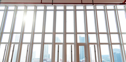 A row of narrow windows in modern building