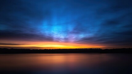 Fototapeta premium Serene Twilight Reflection Over Calm Lake with Colorful Sky