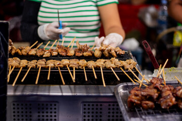 BBQ Grilled squid with meatballs at the city street market