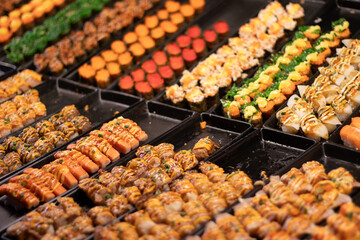 BBQ Grilled squid with meatballs at the city street market