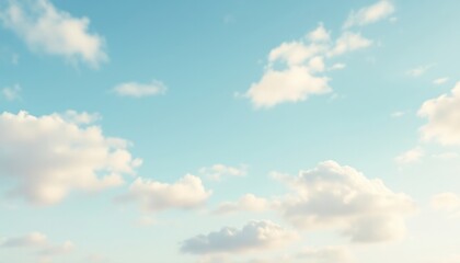 Fototapeta premium Idyllic blue sky with soft white clouds on a sunny day