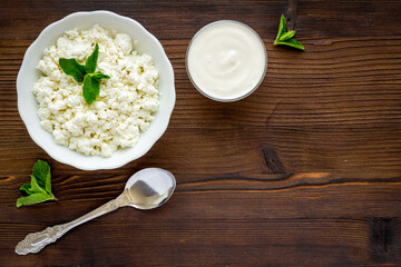 Farm cottage cheese in a bowl, top view. Healthy breakfast