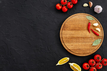 Cooking layout with wooden cutting board and vegetables. Menu concept