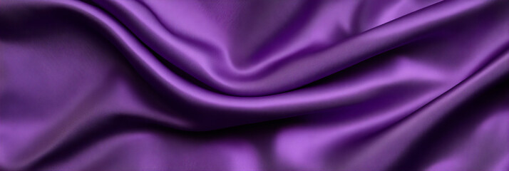 Obraz premium Elegant purple satin fabric draping softly with a smooth texture in natural light setting