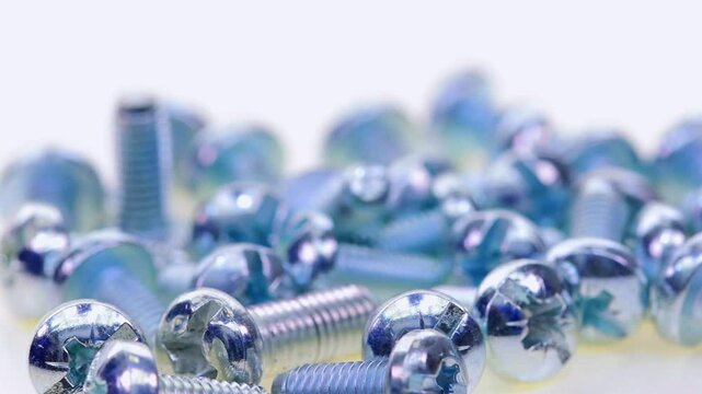 Metal screws for fastening equipment. Soft focus. Close-up. 