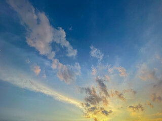 Beautiful sky with natural gradations. Thick clouds in the dusk sky on a winter night. Image of a cloudy sky in the afternoon. View of the night sky with golden light from the evening sun