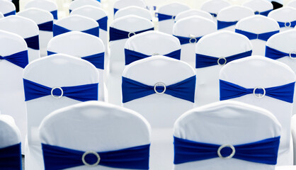 Many empty chairs in the conference room