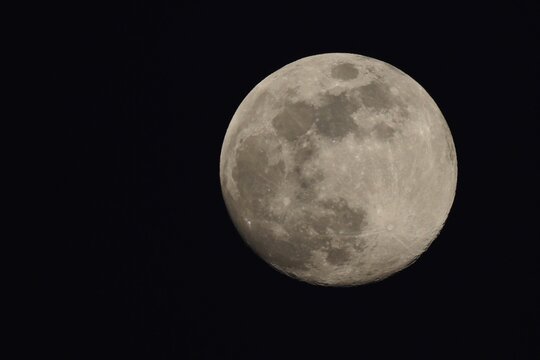 Full moon against a dark sky