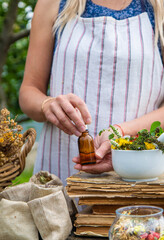 Medicinal herbs woman alternative medicine. Selective focus.