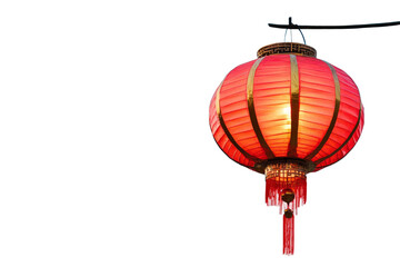 Obraz premium Red Chinese lantern glowing with golden loop and tassels isolated on transparent background.