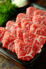 A tray of meat with a lot of white and red meat. The meat is cut into small pieces