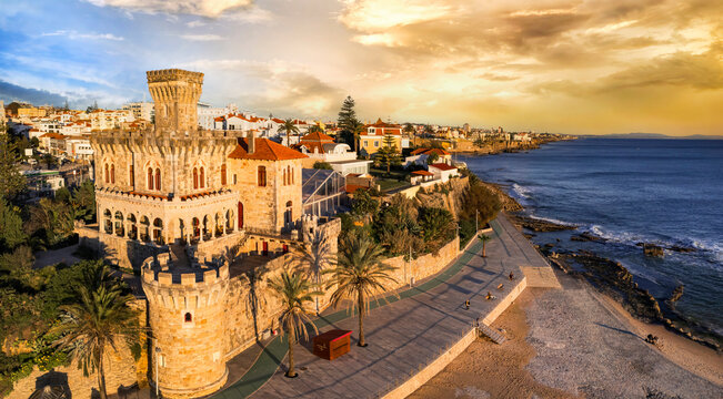 Aerial Drone view of Tamariz Beach and Forte da Cruz Castle in Estoril at Sunset Portuguese Riviera Coastal Landscape High Resolution