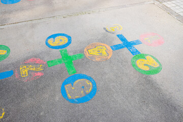 colourful painted children playground games in a school yard