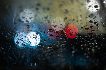 Raindrops on the glass in the evening
