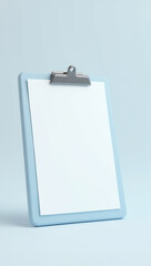 blank white paper on light blue clipboard