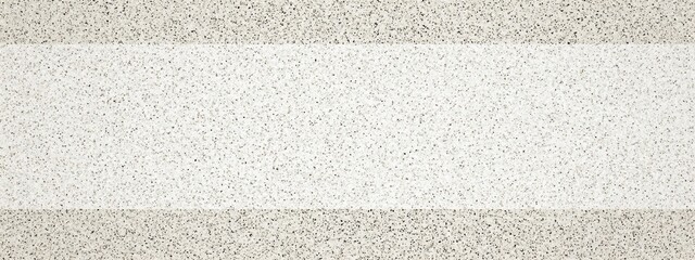 Fototapeta premium Abstract textured background with horizontal stripes of light and dark beige.