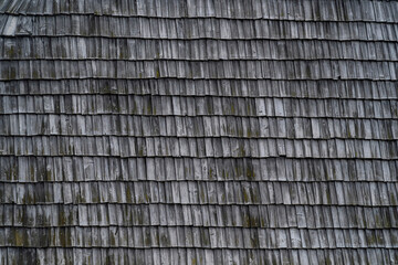 Wooden shakes (Wood shingle) historic roof as texture.