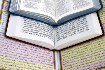 Obraz premium Christianity, Islam and Judaism. Bible, Quran and Torah. Interfaith or interreligious religious symbols. Faith and spirituality concept.