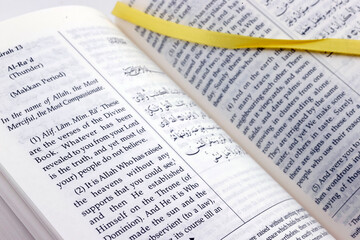 Obraz premium Translation of the Holy Quran into English. Name of Allah. Islam.