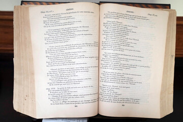 Old bible open in a church.  Paris. France.