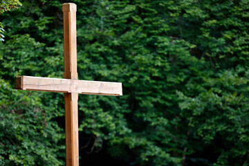 Wooden cross in nature. Christian symbol. La Roche sur Foron..  France.