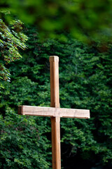 Wooden cross in nature. Christian symbol. La Roche sur Foron..  France.