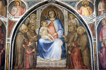 Fototapeta premium Basilica of Saint Anthony of Padua. Chapel of Blessed Luca Belludi by Giusto de' Menabuoi 1382. Our Lady Enthroned Among Franciscan Saints. Padua. Italy.