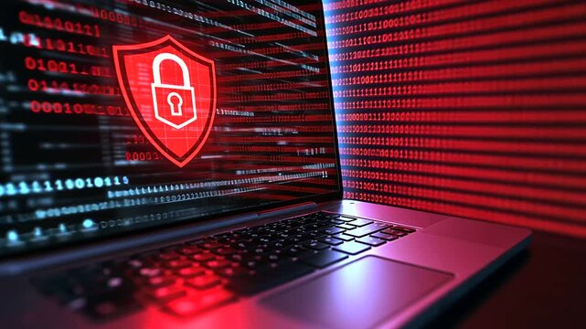 A digital workspace with an open laptop displaying a glowing red shield and padlock symbol, surrounded by subtle binary code cascading down the background