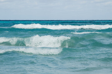 Ocean waves gently breaking on the shore
