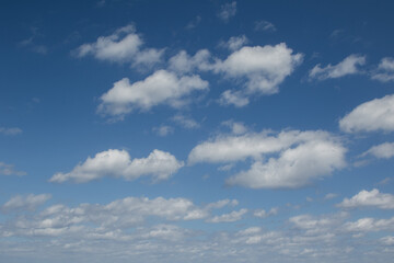 Blue Sky with White Fluffy Clouds