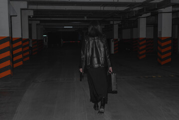 Woman on undeground parking