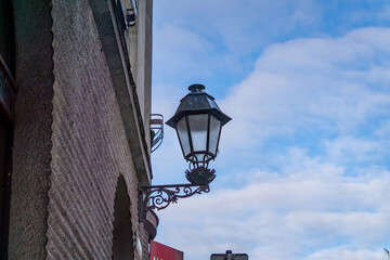 architecture of the old town. old style streets and buildings. architecture and buildings on the market square in the city. historic tenement houses with ancient electric lanterns. old city lighting.