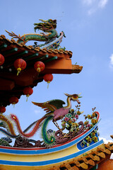Chinese Thean Hou Temple dedicated to the goddess Mazu and Guan Yin. Roof decoration with crane and...