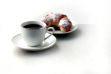 cup of coffee and croissant