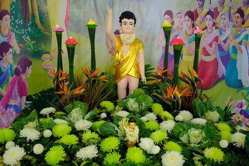 Thien Quang buddhist pagoda.  Infant Buddha statue pointing the north. On Vesak Day, Buddhists ...