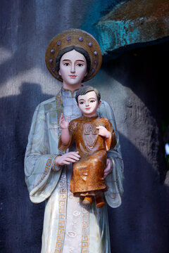 Basilica of Our Lady of La Vang. Our Lady of La Vang holding a figure of the baby Jesus. Virgin Mary.  Vietnam.