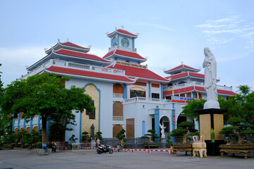 Tac Say Catholic Church  with the tomb house of  Francis Xavier Truong Buu Diep. who was a famous  Vietnamese Catholic priest killed in 1946.  Bac Lieu. Vietnam. . © Godong Photo