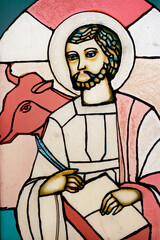 Tac Say Catholic Church.  Stained glass window. Apostle. Saint Luks the evangelist.  Bac Lieu. Vietnam. .