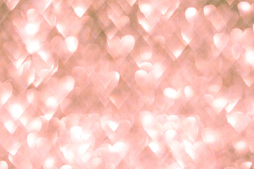 Soft pink hearts with bokeh effect creating a romantic abstract background